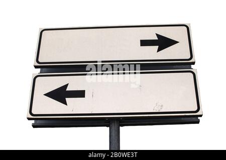 Crossroads Road Sign, Two Arrow on white background, Isolated. Two way blank road sign with copy space. Two arrows on a pole pointing Stock Photo