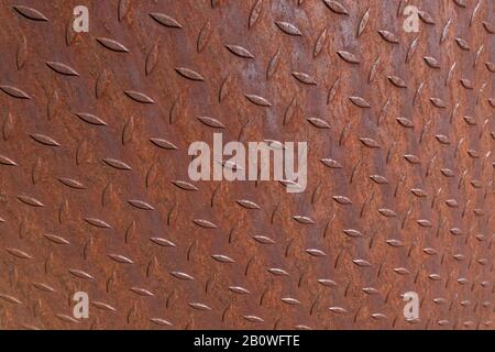 Pattern of a slightly bent, rusty metal surface Stock Photo