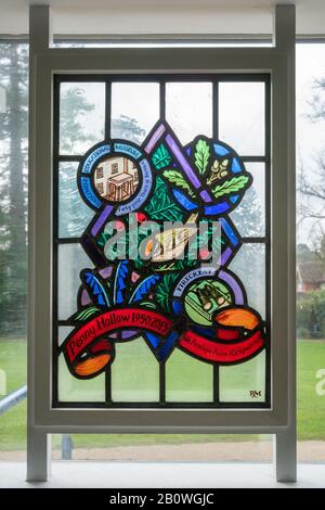Stained glass window in memory of Penny Hollow nee Penelope Anne Kirkpatrick for 44 years service to Haslemere Educational Museum, UK Stock Photo