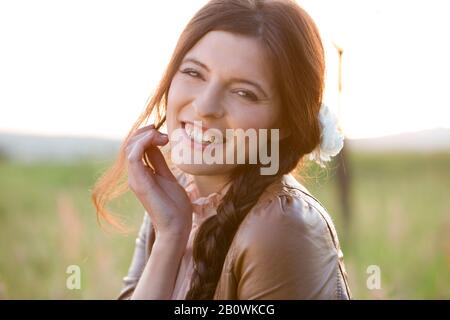 Woman with long brunette hair - portrait Stock Photo