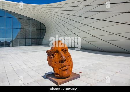 Sculpture of a human face outside the Heydar Aliyev Cultural Center in Baku Azerbaijan Stock Photo
