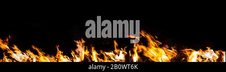Fire flames on black background Stock Photo