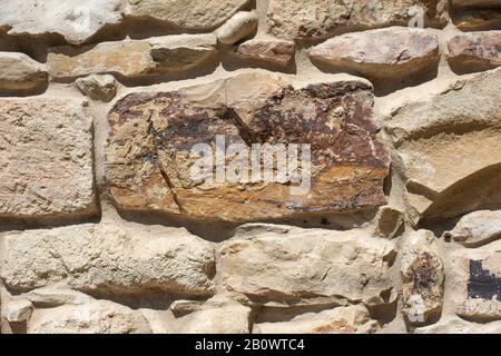 Laying of wild stone, texture of wild stone wall Stock Photo