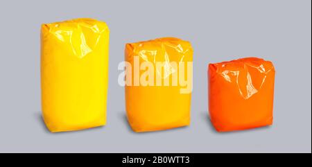 Bag package yellow , orange and red solated on gray background Stock Photo