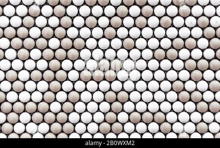 Ceramic mosaic tiles with beige and white circles. Stock Photo