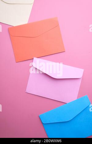 Close up of colorful envelope on color background  Stock Photo
