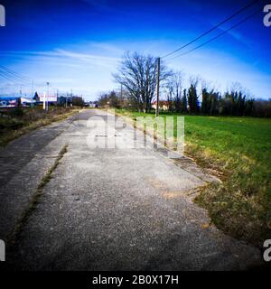 Abandonned portion of RN6 road, Holga digital picture, France Stock Photo