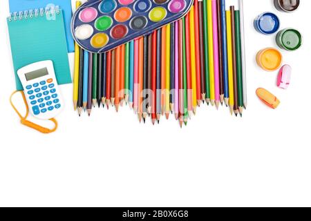 Collection of school supplies, isolated on pure white background. Free space for text. Flat lay, top view. Stock Photo