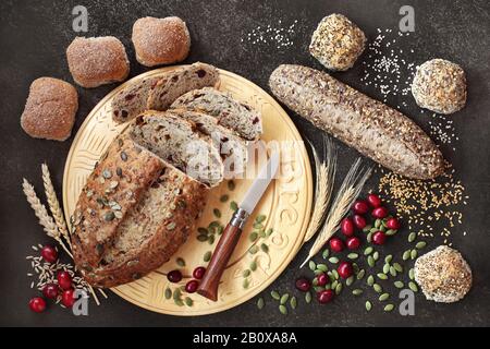 High fibre cranberry & pumpkin seed rye bread with wholemeal & seeded rolls. High in vitamins, antioxidants & omega 3 with low gi. Stock Photo