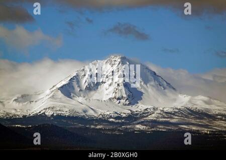 North Sister Peak, 10,051 feet in elevation, in the central Oregon Cascade Mountains ner Bend, Oregon, in January. Stock Photo