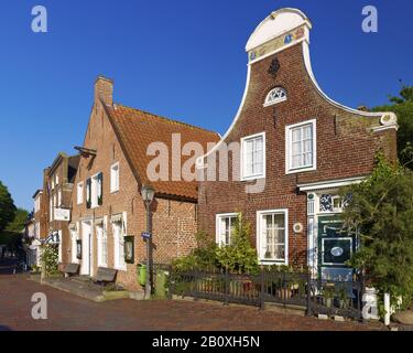 Houses at the harbor, Greetsiel, East Frisia, Lower Saxony, Germany, Stock Photo