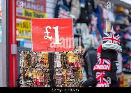 London, January 26 2020. Postcards, t shirts, hats, refrigerator magnets and other souvenirs at gift shop Stock Photo