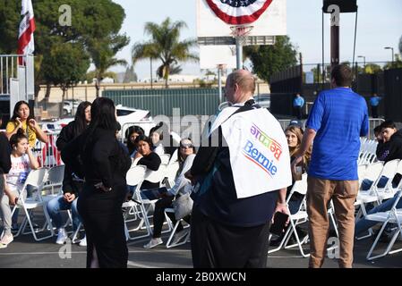 SANTA ANA, CALIFORNIA - 21 FEB 2020: Bernie Sanders Rally. A Supporter of the candidate sporting a Bernie Banner. Stock Photo