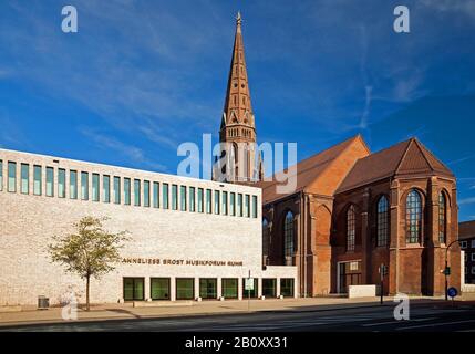 Anneliese Brost Musikforum Ruhr and church of St. Mary, Germany, North Rhine-Westphalia, Ruhr Area, Bochum Stock Photo