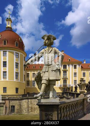Hunting horn player in front of Moritzburg Castle near Dresden, Saxony, Germany, Stock Photo