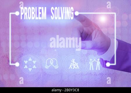 Writing note showing Problem Solving. Business concept for to find an answer or means of effectively dealing with Stock Photo