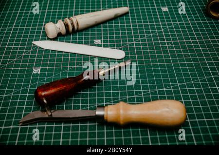 Leather crafting tools still life. handmade. leather tools Stock Photo