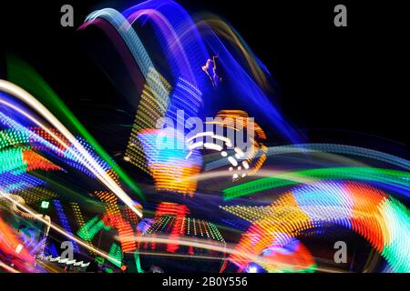 blurred lights on the Hamburg DOM, Karrusell, light, dynamic, light trails, Heiligengeistfeld, Hamburg, Germany, Europe Stock Photo