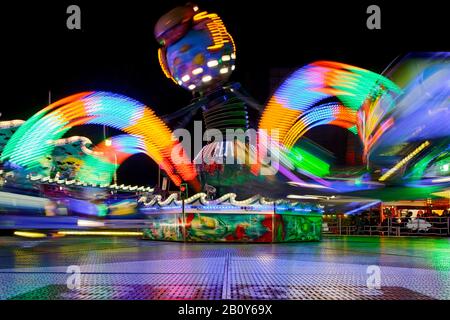 Dynamic light trails, Hamburg DOM, carousel, Hamburg, Germany Stock Photo