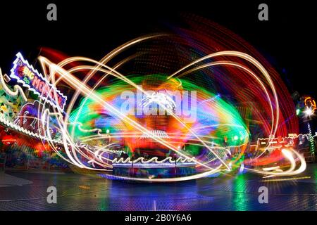 Dynamic light trails, Hamburg DOM, carousel, Hamburg, Germany Stock Photo