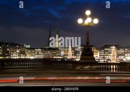 Light trails from passing cars, Kennedy Bridge, Binnenalster, City, Hamburg, Germany, Europe Stock Photo