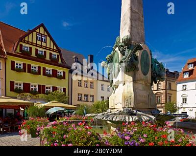 Market square with open-air café and Luitpoldbrunnen in Kulmbach, Upper Franconia, Bavaria, Germany, Stock Photo