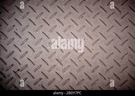 A closeup of steel diamond plate texture walkway. Stock Photo