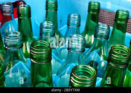 A shot of empy glass bottles ready to be recycled. Stock Photo
