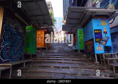 Hong Kong - November 24 2019: Pottinger Street (Stone Slab Street) in Central. The street is paved unevenly by granite stone steps. Stock Photo