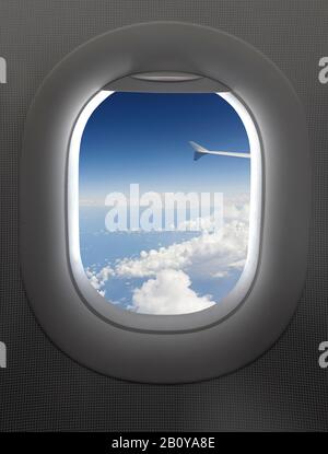 View through an airplane window, clouds, Stock Photo