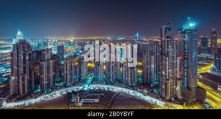 Executive Towers in Business Bay at night from a bird's eye view, Downtown Dubai, United Arab Emirates, Stock Photo