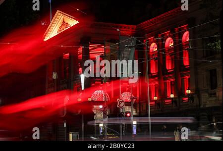 (200222) -- SYDNEY, Feb. 22, 2020 (Xinhua) -- Melbourne Town Hall is lit up in red in Melbourne, Australia, Feb. 21, 2020. As China is fighting the outbreak of COVID-19, the Victorian state government of Australia launched a new campaign on Thursday to show their support for the Chinese communities at home and abroad. As part of the campaign, a number of Victoria landmarks, including the Arts Center, National Gallery of Victoria, Melbourne Museum, Melbourne Town Hall and Flinders Street Station, were be lit up in red and gold on Friday as a symbol of solidarity with Chinese Victorians. (Xinhua Stock Photo