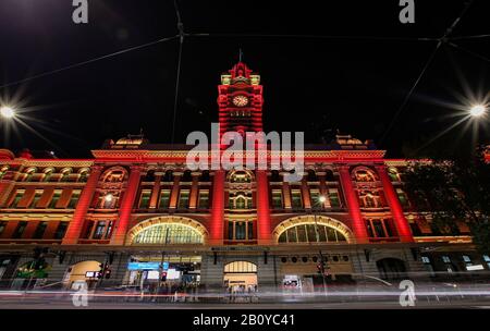 (200222) -- SYDNEY, Feb. 22, 2020 (Xinhua) -- Flinders Street Station is lit up in red in Melbourne, Australia, Feb. 21, 2020. As China is fighting the outbreak of COVID-19, the Victorian state government of Australia launched a new campaign on Thursday to show their support for the Chinese communities at home and abroad. As part of the campaign, a number of Victoria landmarks, including the Arts Center, National Gallery of Victoria, Melbourne Museum, Melbourne Town Hall and Flinders Street Station, were be lit up in red and gold on Friday as a symbol of solidarity with Chinese Victorians. (Xi Stock Photo