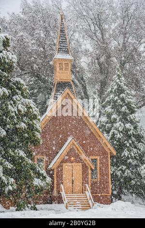 Yosemite Valley Chapel In Snow Storm in winter Stock Photo