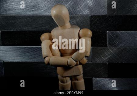 Wooden mannequin with crossed arms - horizontal shot Stock Photo