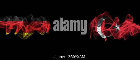 Flags of Germany and Turkey on Black background, Germany vs Turkey Smoke Flags Stock Photo