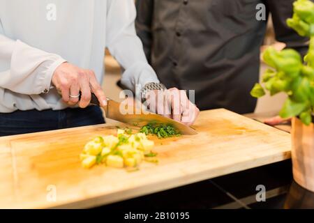 Cook gives a cooking class Stock Photo