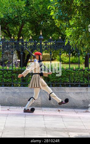 Evzone marching outside the Greek Presidential Palace, Athens, Greece Stock Photo