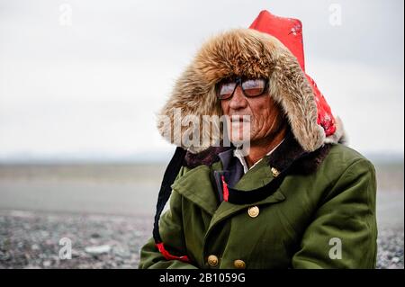 Mongolian men in China of the Meng ethnic minority, Xinjiang. China Stock Photo