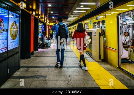 Tourists arriving at Asakusa underground station walking toward Sensoji Temple. Stock Photo