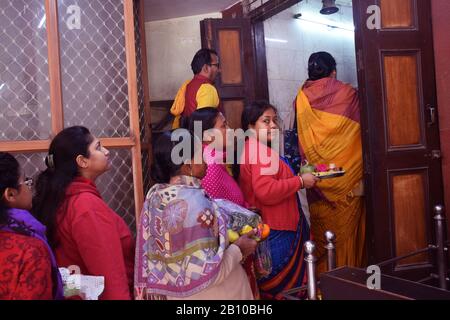 Women devotees waiting for their turn for Shiva Pooja during Shivratri festival in India Stock Photo