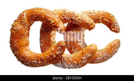 Three pieces of austrian pastry rolls kifli of kipfel sprinkled with nuts and icing sugar, isolated on white, top view Stock Photo