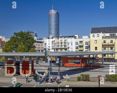 Bus station with Intershop Tower in Jena, Thuringia, Germany Stock Photo