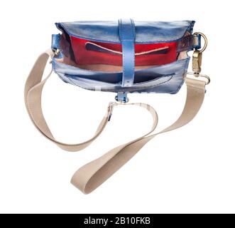 top view of empty blue leather handbag with textile strap isolated on white background Stock Photo