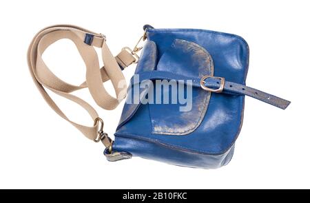 closed blue leather handbag with textile strap isolated on white background Stock Photo