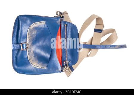 open empty blue leather handbag with textile strap isolated on white background Stock Photo