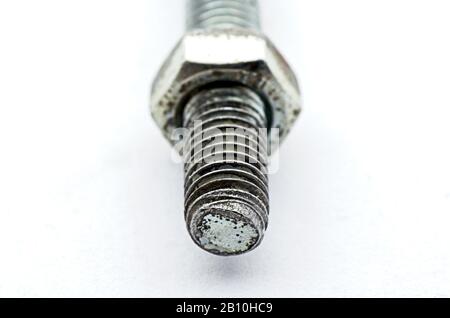 Steel pigtail screw hook on white background. Safety piece of hardware. Stock Photo