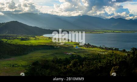 Remote village on the western shore of Lake Danau Poso, Sulawesi, Indonesia Stock Photo