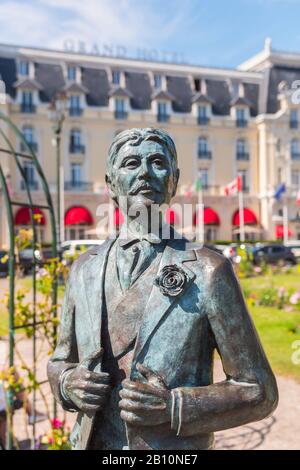 Marcel Proust statue by Edgar Duvivier, Cabourg, Lower Normandy, France. July 2019. Beautiful sculpture of this famous french writer. Grand Hotel
