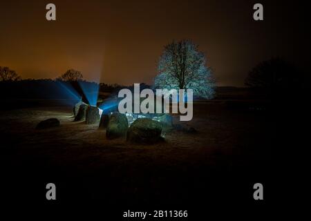 Prehistoric stone monuments scammed in evening landscape for mystical atmosphere Stock Photo